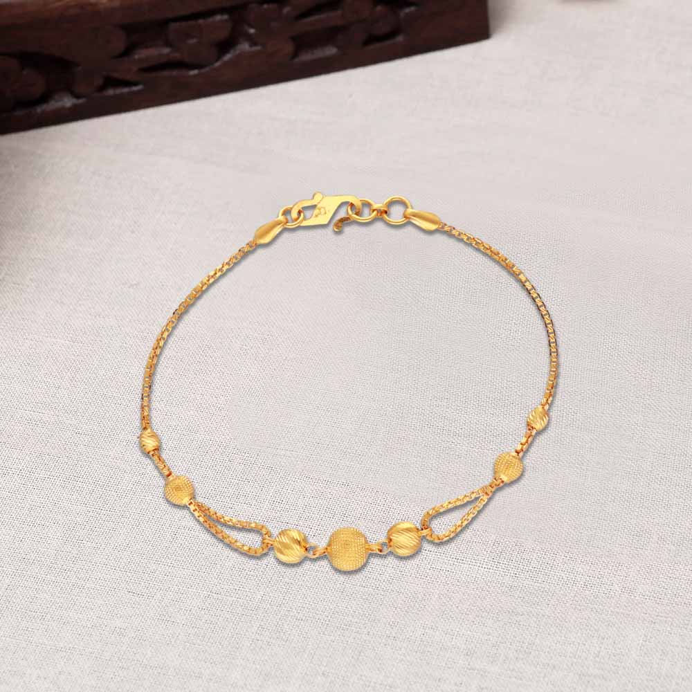 https://www.vaibhavjewellers.com/pub/media/catalog/product/image/16985c6f4/22kt-gold-ball-chain-bracelet-for-girls-71vb2088-71vb2088.jpg
